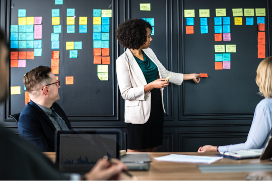 Decorative photo of woman leading meeting