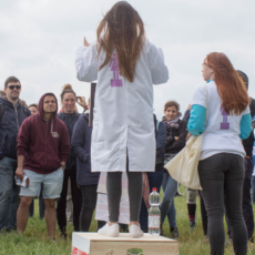 Decorative photo of scientist presenting her research