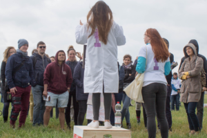 Decorative photo of scientist presenting her research