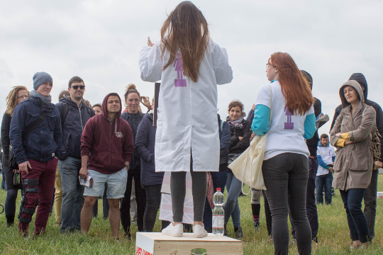 Decorative photo of scientist presenting her research