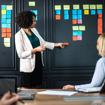 Decorative photo of woman leading meeting