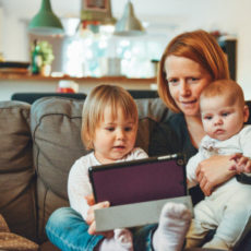 Decorative photo of parent with children