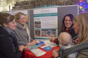 Photo of people and baby at Lichterfest