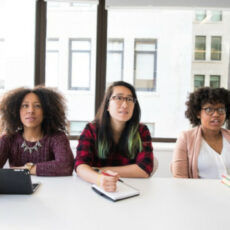 Decorative photo of three women at table