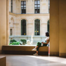 Decorative photo of person looking out window