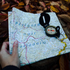 Decorative photo of map and compass