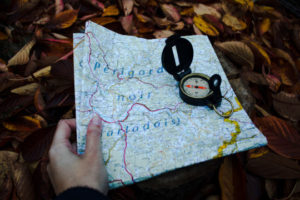 Decorative photo of map and compass