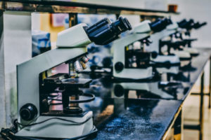 Decorative photo of microscopes in laboratory