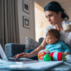 Decorative photo of person working from home with child