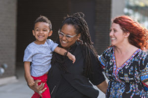 Decorative photo of parents with child