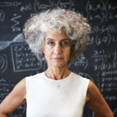 Decorative photo of person looking strong in front of blackboard