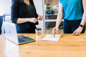 Decorative photo of two people in office