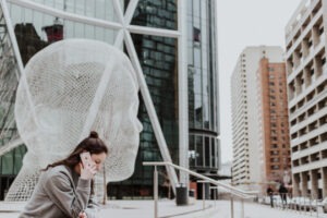 Decorative photo of person on the phone