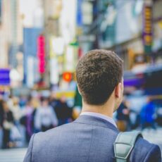 decorative photo of person in a busy street