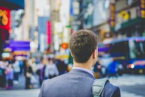 decorative photo of person in a busy street