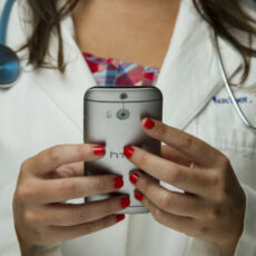 Photo of doctor with phone