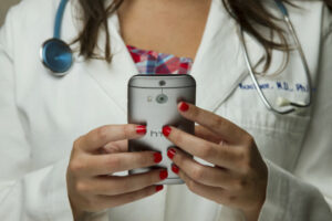 Photo of doctor with phone