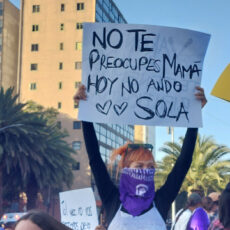 Person demonstrating with self-made poster