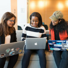 Decorative photo of people with laptops