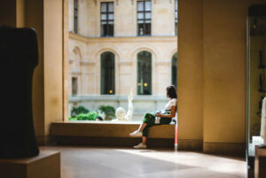 Decorative Person sitting in building