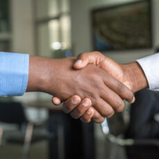 Decorative Photo of two People shaking hands
