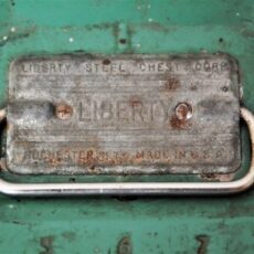 Decorative photo of toolbox displaying the word liberty