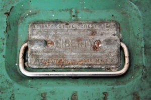 Decorative photo of toolbox displaying the word liberty